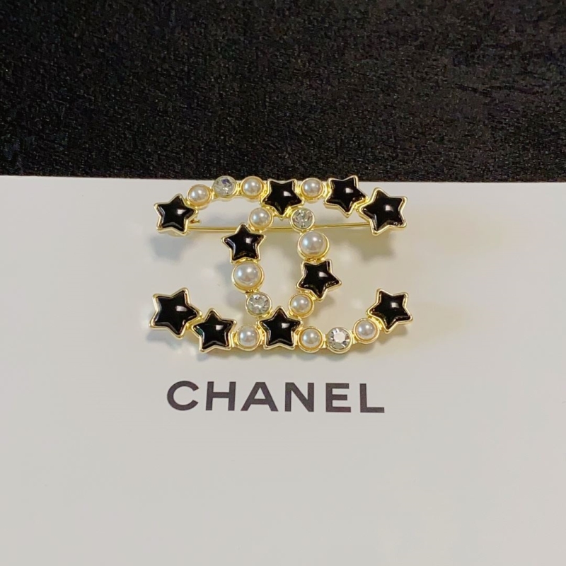 Ch**el brooches